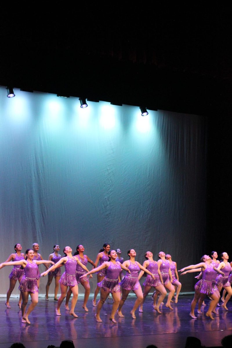 THAT'S A WRAP: The last dance performance was performed by the JV Star Dancers to the song “Come This Far”. The bright purple outfits worn by the dancers drew attention to their amazing performance.