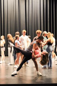 JUNIORS TAKE A DIP: Line Dancing Club president Kynnadi Bryan dips junior Angelina Prieto during their Wednesday meetings in FIT. Last week, the girls taught a spin dip and variations of the Cotton Eyed Joe. 