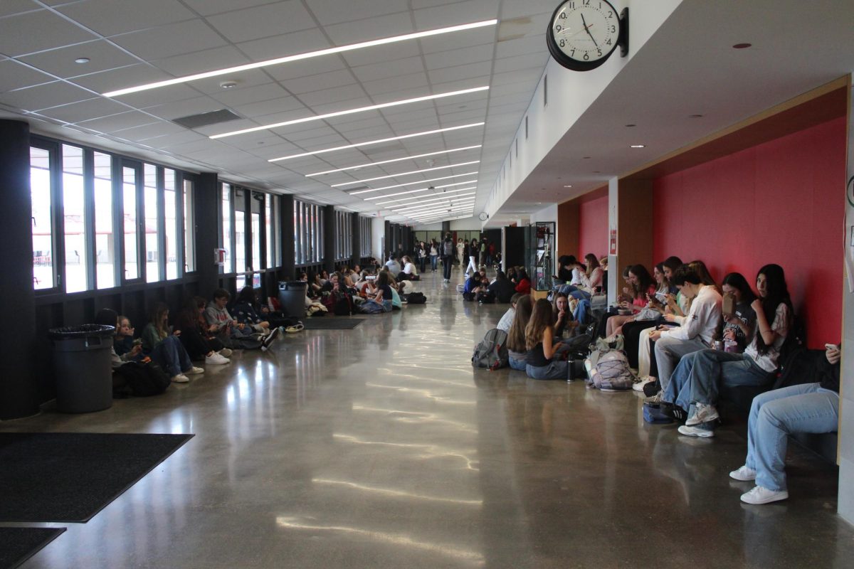 Students during lunch line the halls of the fine arts building when it's too cold to sit outside. 