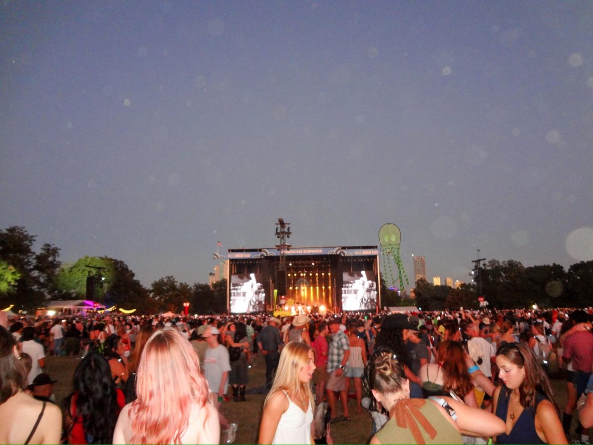 CAPTURING THE ENERGY: Dust fills the air as the ACL crowd moves through Zilker Park. There were nine stages at ACL this year, featuring over 100 artists across the two weekends.  