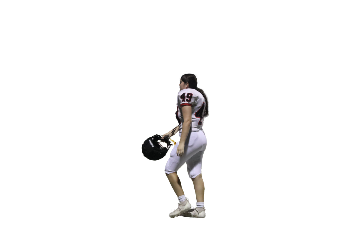 WALKING WITH PURPOSE: Maddie Kerrigan steps off the field after a hard fought game. The Bowie Bulldogs came out victorious.