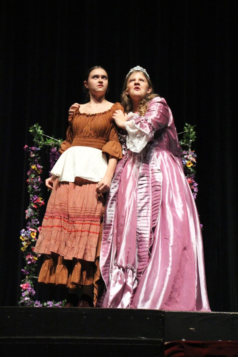 POPPING PERSONALITIES: Freshman Reece Wheeler and Grace Dawson perform side by side bringing “Bedtime Stories” to life. Dawson enjoyed getting to step out of her comfort zone and play an over the top character.