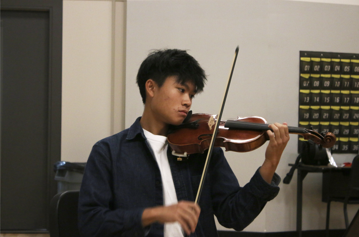 ROMANTICISM: Ryan Soon practices his violin after school, preparing pieces for their string quartet. Soon is very passionate about playing pieces from the romantic period and hopes to work on them with his quartet group.