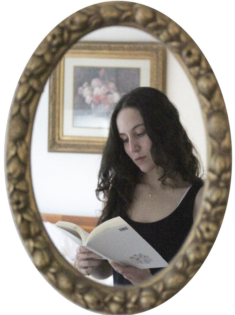 MIRROR TO THE INSIDE: Emma Lopez scans the words of her poetry book. These words serve as a mirror into her brain and reveal her true feelings. 
