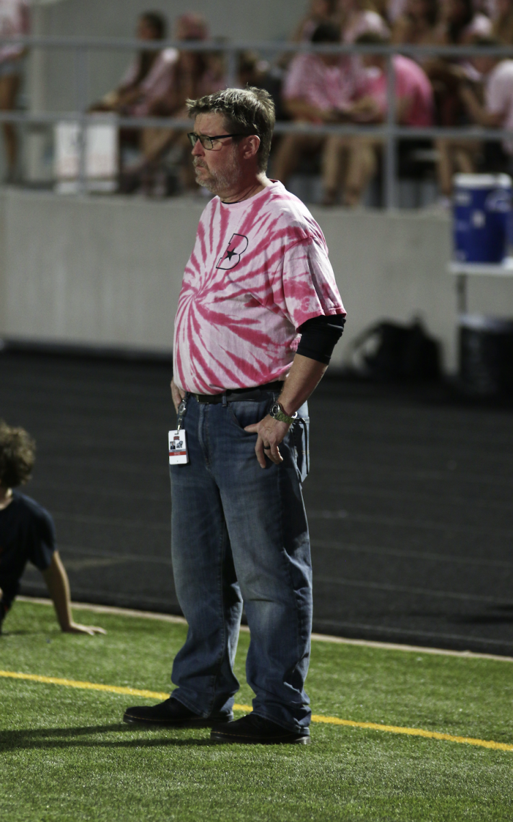 PEPPED UP FOR PINK OUT: Robinson would stand sideline for nearly every home football game. He showed continuous support for student events and was often in attendance of games.