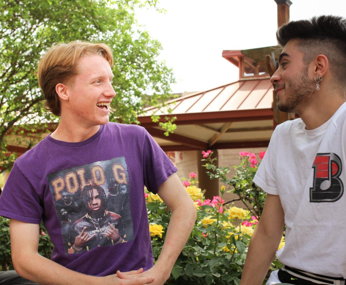 CONVERSATIONS & CONNECTIONS: Roman Jacobs talks to a friend during lunch. Jacobs enjoys striking up conversation with as many people as possible, taking inspiration from his mom and sister's kindness. 
