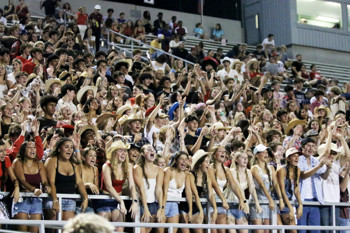 Students flock to the cheering sections of Burger Stadium to support the Bowie Bulldogs at a game earlier this year.